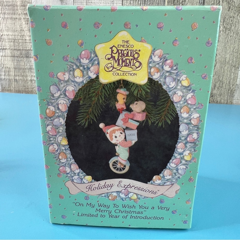 The Enesco Precious Moments Collection Holiday Expressions Unicycle Dated 1992